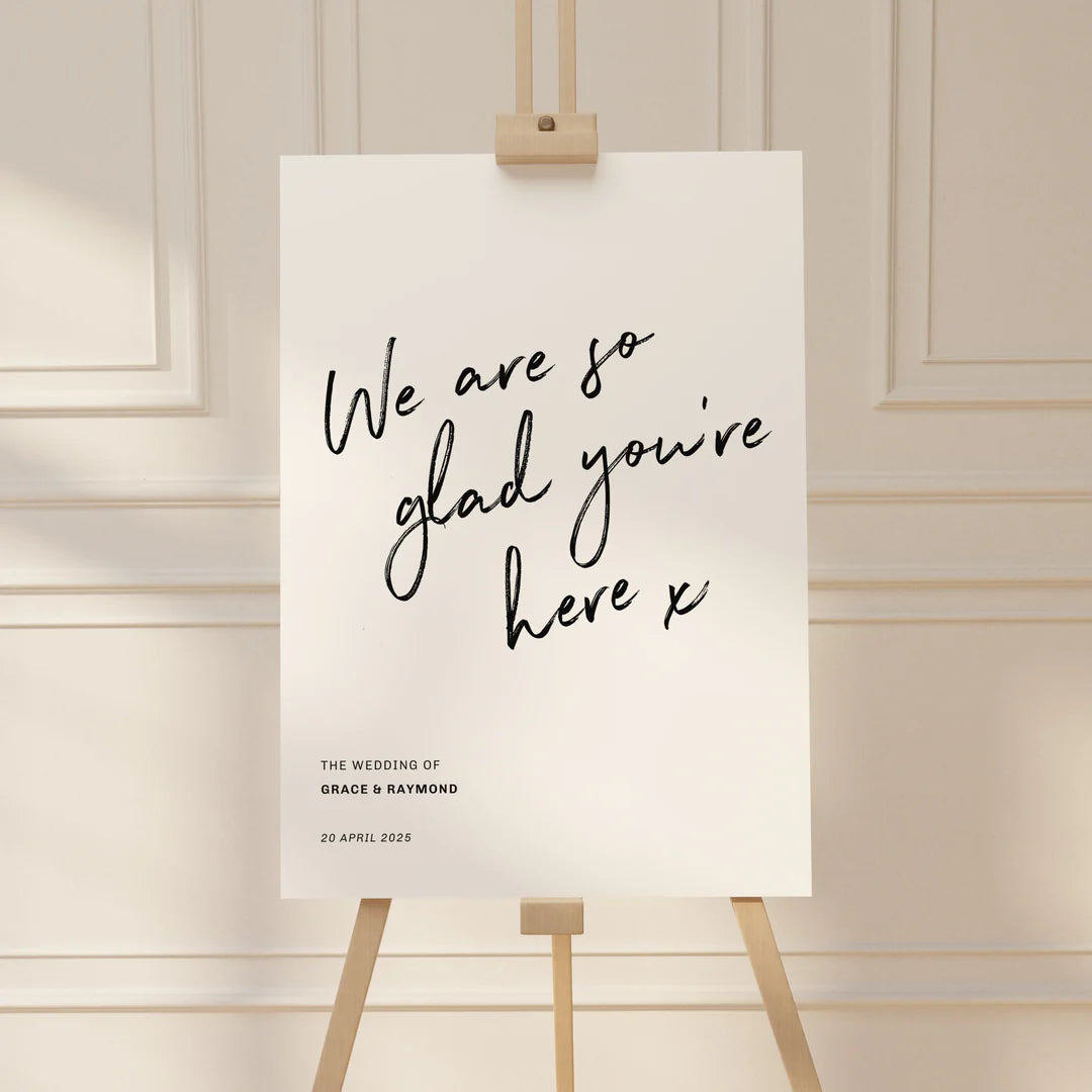 'We are so glad you're here" Wedding Welcome Sign